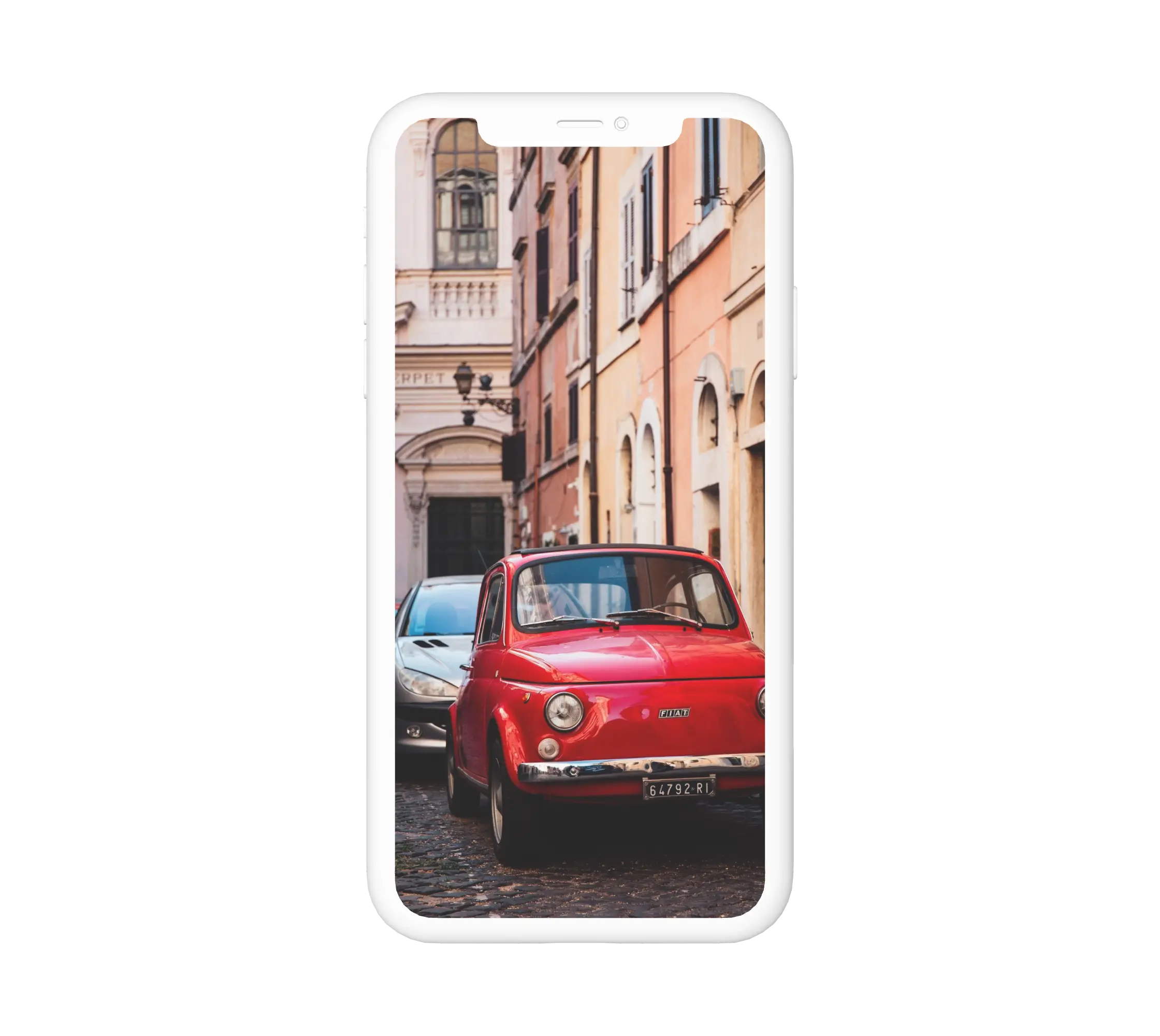 Kis piros autó a városban